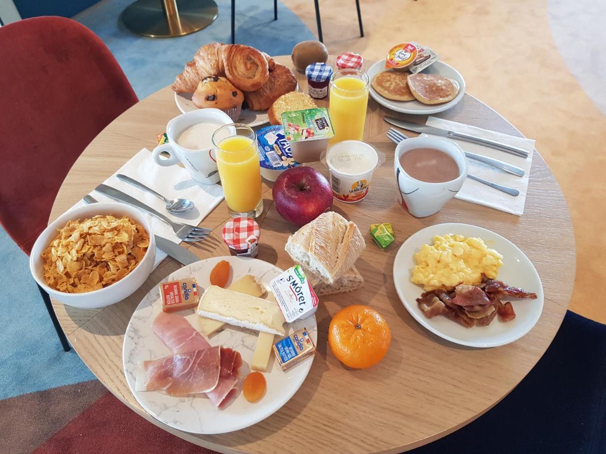 Kyriad - Aéroport 3*